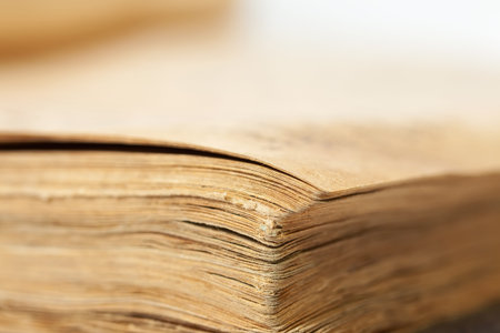 Closeup of pages of old book. Shallow DOF