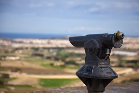 coin operated monocular for viewing town and sightseeing. Malta