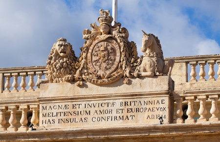 Detail of gate - lion and horse with emblem. Maltaの写真素材