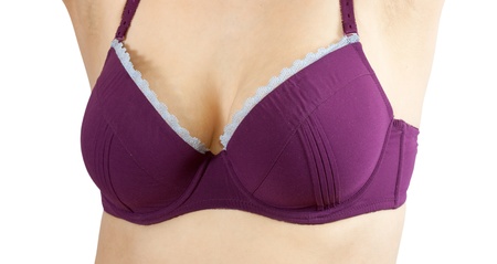 Close-up photo of the woman chest in violet braの写真素材