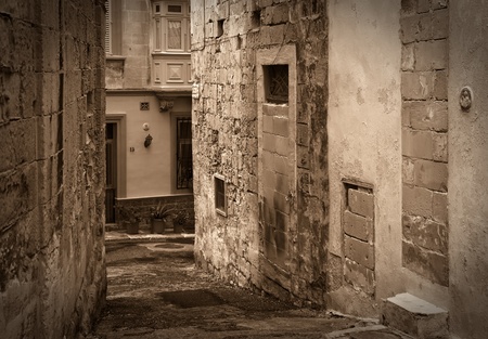 Retro photo of street in old mediterranean town (Valletta, Malta)の写真素材