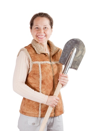 Happy mature  woman  with spade over whiteの写真素材