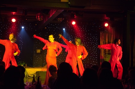 SPAIN, LA MASIA - APRIL 4, 2011:  Hispanic dansers performaning  flamenco  on inside scene  in  evening April 4, 2004 at La Masia, Spain. Flamenco - Traditional  hispanic danceのeditorial素材