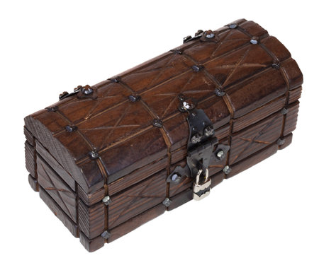 Closed wooden treasure, isolated over white background