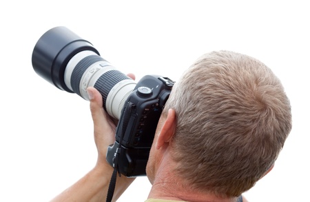 photographer man with camera, isolated over white backgroundの写真素材