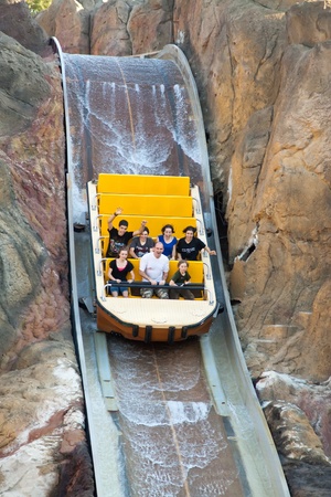 SALOU, SPAIN - APRIL 11: People riding in Theme Park in April 11, 2011 in Salou, Spain. Tutuki Splash   is one of most exhilarating rides in  Port Aventuraのeditorial素材