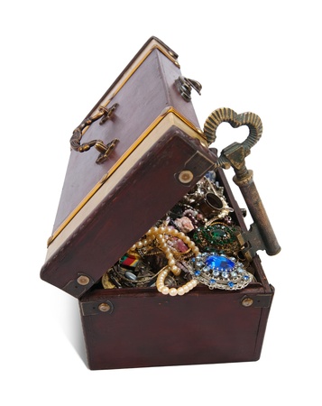 wooden treasure chest with valuables and gem, isolated over white backgroundの写真素材