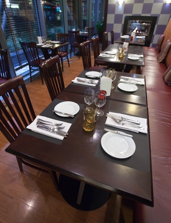  Restaurant dinner table with wine glass and silverwareのeditorial素材