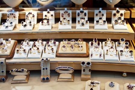counter with garnet jewelry in store windowのeditorial素材