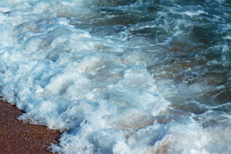 Surface of sea wave on sand beach