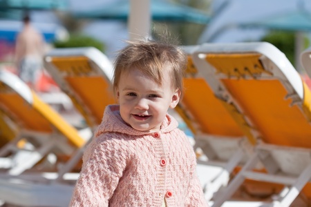 Happy toddler at resort hotel areaの写真素材