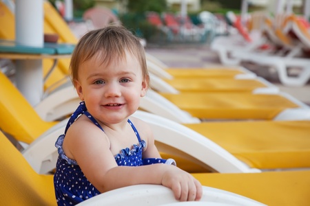 Happy toddler at resort hotel areaの写真素材