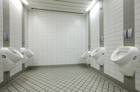 Few white urinals in toiletのeditorial素材