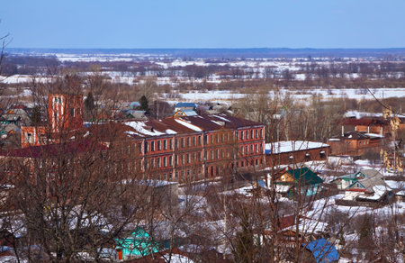 View of Vyazniki with factory in March. Russia