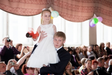 VLADIMIR, RUSSIA - MAY 24: Last Bell event. May 24, 2012 in Vladimir, Russia.  School leavers celebrate the Day of Farewell Bell  in school &#8470; 33.  School graduates say farewell to school lifeのeditorial素材