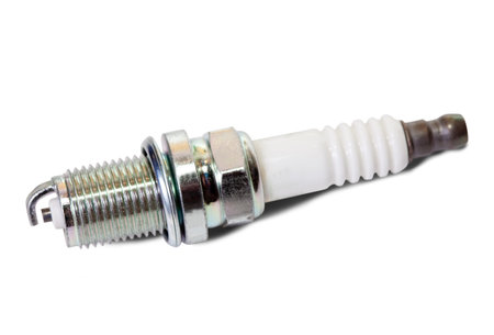 auto spark plug isolated on white background
