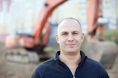 Portrait of manual worker at building site の写真素材