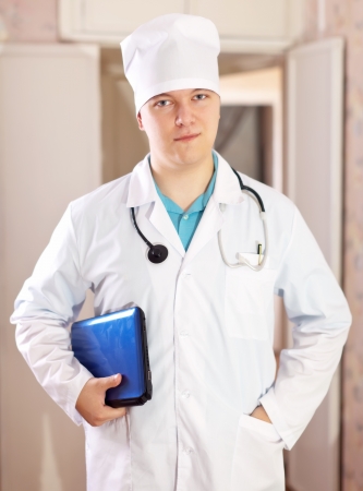 Portrait of male doctor in hospital interiorの写真素材