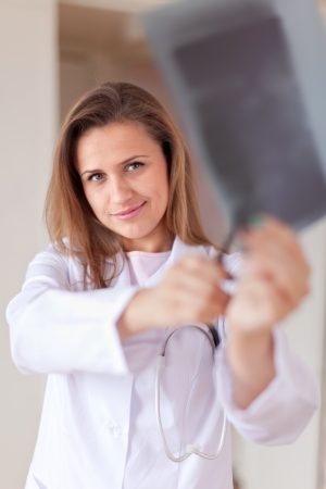 friendly doctor stares x-ray scanの写真素材