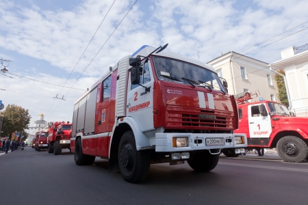 VLADIMIR, RUSSIA - SEPTEMBER 15: City Day  event September 15, 2012 in Vladimir, Russia.  Fire trucks in carnival procession  dedicated to the 1022 anniversary of Vladimir cityのeditorial素材
