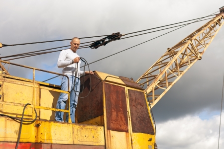 Portrait of tractor operator at sand pitの写真素材