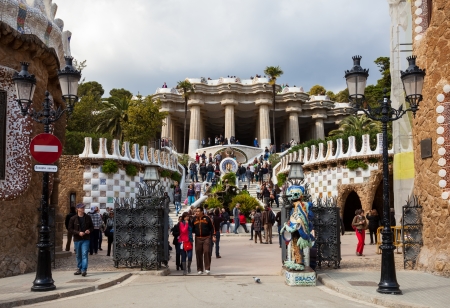 BARCELONA, SPAIN - MARCH 12: Entrance in Park Guell in March 12, 2013 in Barcelona, Spain. Park was designed by Gaudi and built in 1900 to 1914, it has an extension of 17.18 ha. Now it is city parkのeditorial素材