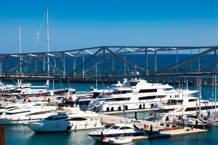 BARCELONA, SPAIN - MARCH 15: Docked yachts lying in Port Forum in March 15, 2013 in Barcelona, Spain. Universal Forum of Cultures was a 141-day international event in 2004 のeditorial素材