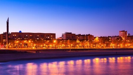 View of Barcelona from sea side in night. Spainの写真素材