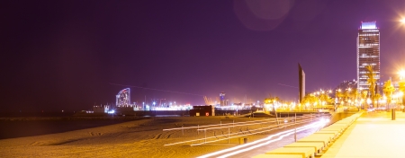 night view of Port Olimpic - center of nightlife at Barcelona, Spain の写真素材