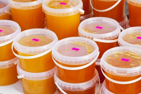 natural bee honey  on counter of marketの写真素材