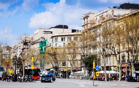 BARCELONA, SPAIN - MARCH 28: Passeig de Gracia in March 28, 2013 in Barcelona, Spain. It one of major avenue in city. Located in the Eixample district. Shopping and business areasのeditorial素材