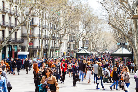 BARCELONA, SPAIN - MARCH 28: crowd of people  at La Rambla in March 28, 2013 in Barcelona, Spain. La...