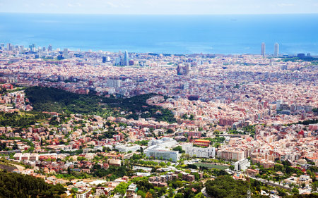 Top general view of Barcelona from high point in cloudy day. Spainの写真素材