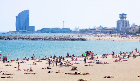 BARCELONA, SPAIN - JUNE 28: View of Nova Icaria beach in summer in June 28, 2013 in Barcelona, Spain. One of the beaches of the Mediterranean coastのeditorial素材
