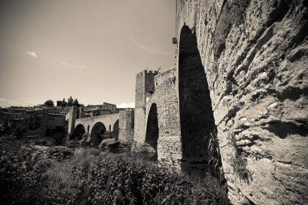 Vintage photo of medieval fortifications and bridge. Besaluのeditorial素材