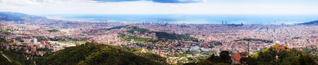Day panoramic  view of picturesque Barcelona cityscape from Tibidabo. Catalonia, Spainの写真素材