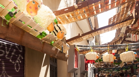 BARCELONA, CATALONIA - AUGUST 15: Gracia Festival Decorations in August 15, 2013 in Barcelona, Catalonia.Each street is decorated with hand residents of the street. Farm themeのeditorial素材