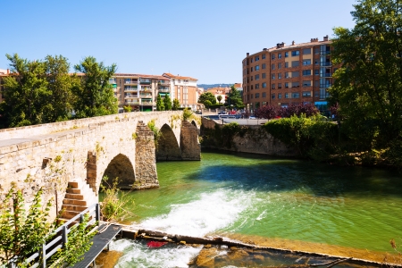 Old bridge over Arga river in sunny day. Pamplona, Navarre のeditorial素材
