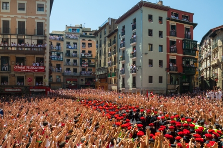 PAMPLONA, SPAIN - JULY 6: Start of San Fermin festival in July 6, 2013 in Pamplona, Spain.Municipal Orchestra playing in the squareのeditorial素材