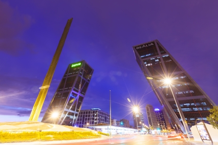 MADRID, SPAIN - AUGUST 28: Plaza de Castilla in night on August 28, 2013 in Madrid, Spain.Monument to Calvo Sotelo, Caja Madrid Obelisk and Torres Kioのeditorial素材