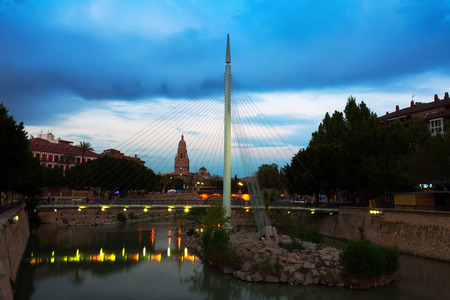 MURCIA, SPAIN - APRIL 15, 2014: Footbridge called Pasarela del Malecon over Segura in evening. Murcia, Spainのeditorial素材