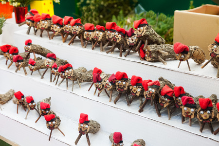 Caga tio for sale on counter at Christmas marketの写真素材