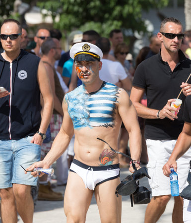 SITGES, SPAIN - JUNE 15, 2014: Guys during  Gay pride parade in Sitges, Cataloniaのeditorial素材