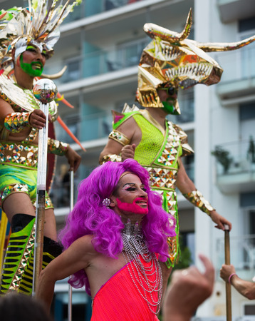 SITGES, SPAIN - JUNE 15, 2014: Performers at procession during  last day of Gay pride parade in Sitges, Cataloniaのeditorial素材