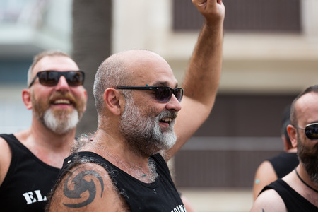SITGES, CATALONIA - JUNE 15, 2014: Happy bearded men at  gay pride parade in Sitges. Cataloniaのeditorial素材