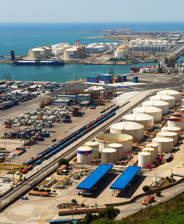 BARCELONA, SPAIN - JUNE 21, 2014:  Industrial port of Barcelona. One of the largest port in Mediterranean, has more than 3,000 metres of berthing lineのeditorial素材