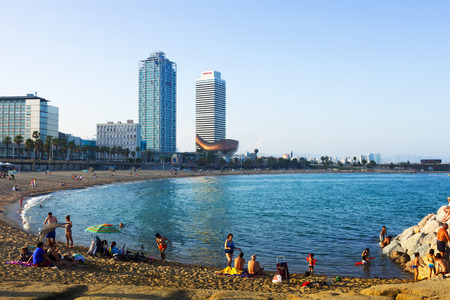 BARCELONA, SPAIN - JUNE 23, 2014: Somorrostro beach in evening. Barcelona, Spain. 
Mediterranean coast in Catalonia has beaches with entertainment to suit all tastesのeditorial素材