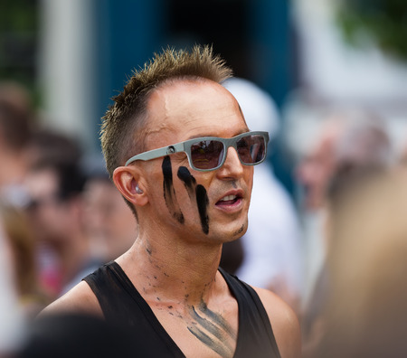 SITGES, SPAIN - JUNE 15, 2014: An unidentified guy at procession in last day of Gay pride parade in Sitgesのeditorial素材