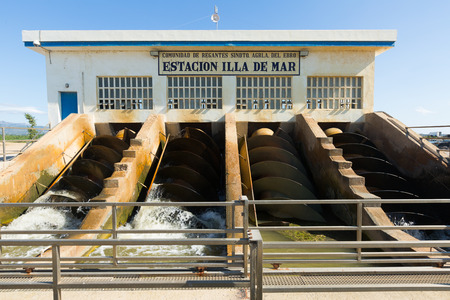 EBRO DELTA, SPAIN - AUGUST 13, 2014: Water control station at delta of Ebro riverのeditorial素材