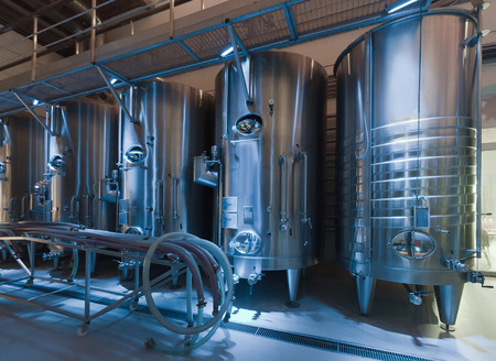 barrels in interior of contemporary winemaker factoryのeditorial素材
